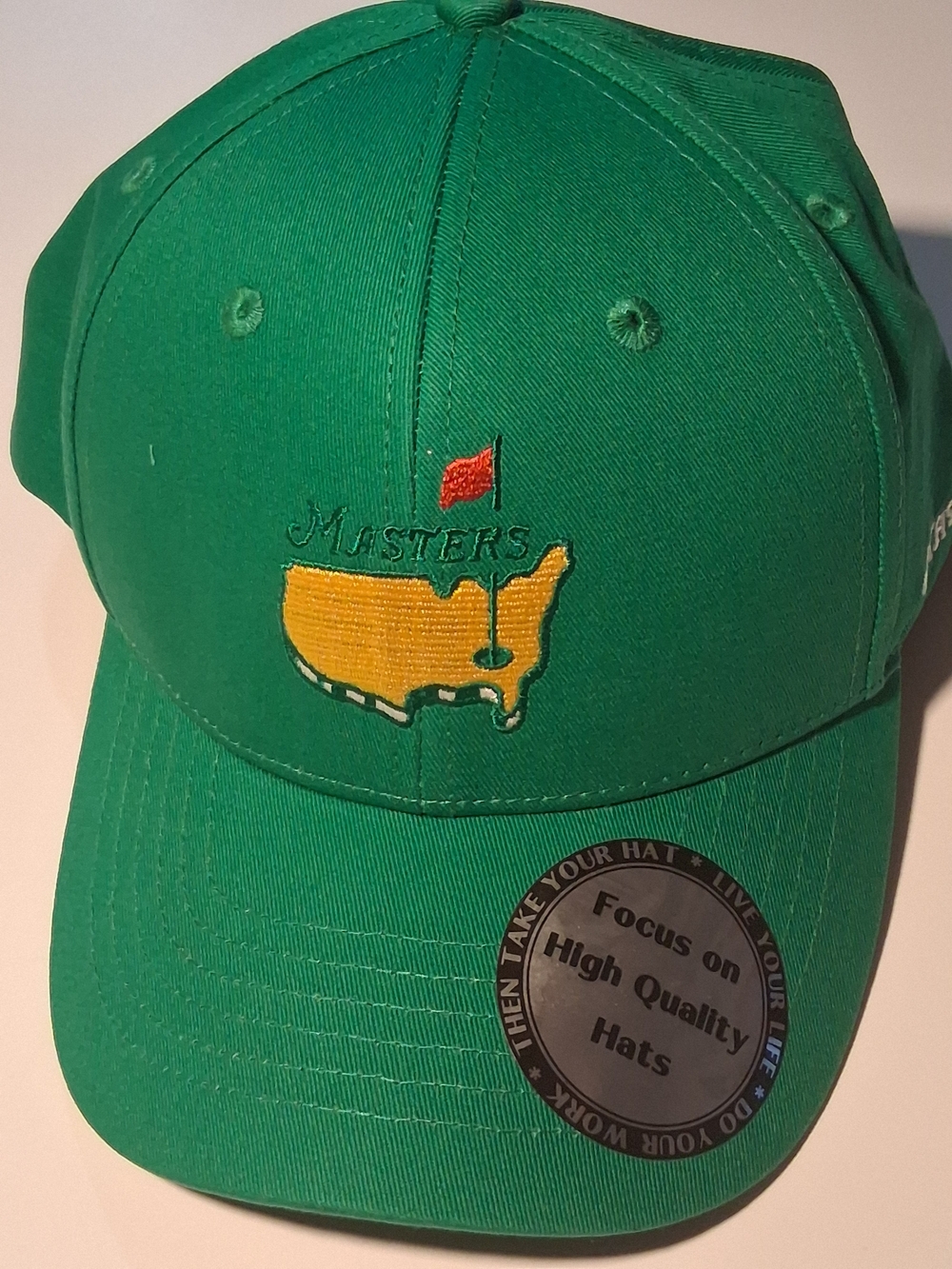 Masters Green Hat with Yellow and Red Logo